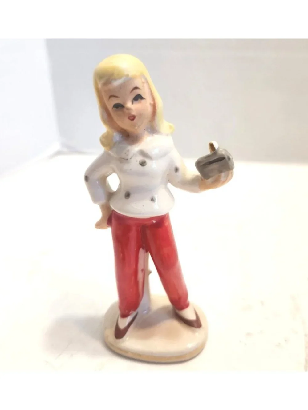 Vintage Small Ceramic Figurine Of Woman Red Pants & White Blouse with Radio READ